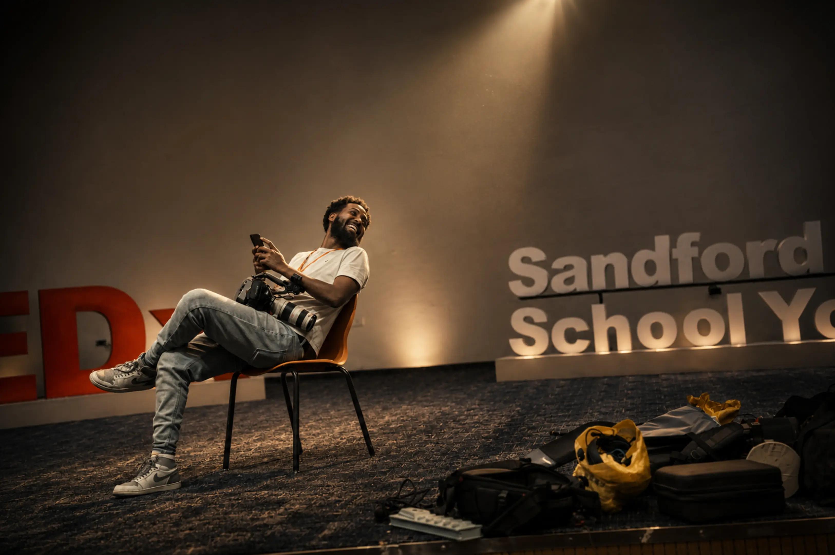 Chanuiel Films photographer at TEDx Sandford backstage